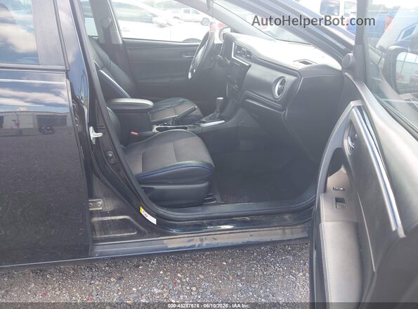 2T1BURHE8HC835735 2017 TOYOTA COROLLA Черный Вид салона спереди