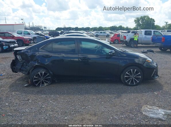 2T1BURHE8HC835735 2017 TOYOTA COROLLA Черный Вид задней части салона