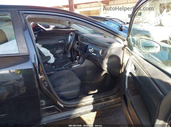 2T1BURHE8HC862224 2017 TOYOTA COROLLA Black Front interior view