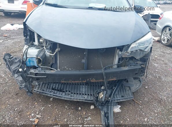 2T1BURHE8JC034096 2018 TOYOTA COROLLA Blue Widok z przodu