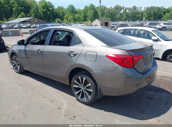 2T1BURHE8KC126052 2019 TOYOTA COROLLA Beige Trasero izquierdo