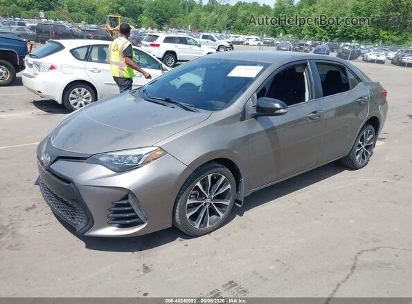 2T1BURHE8KC126052 2019 TOYOTA COROLLA Beige Vista tres cuartos delantera izquierda
