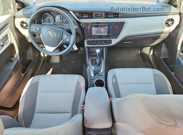 2T1BURHE8KC134779 2019 TOYOTA COROLLA Синий Вид панели приборов