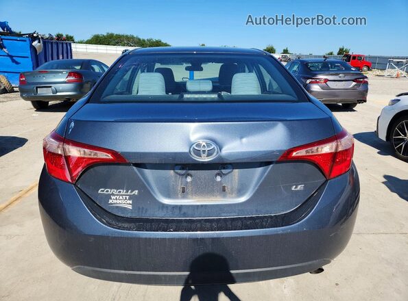 2T1BURHE8KC134779 2019 TOYOTA COROLLA Синий Вид сзади