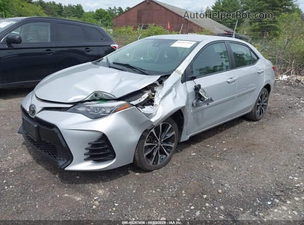 2T1BURHE8KC149962 2019 TOYOTA COROLLA Серебряный Передняя левая четверть