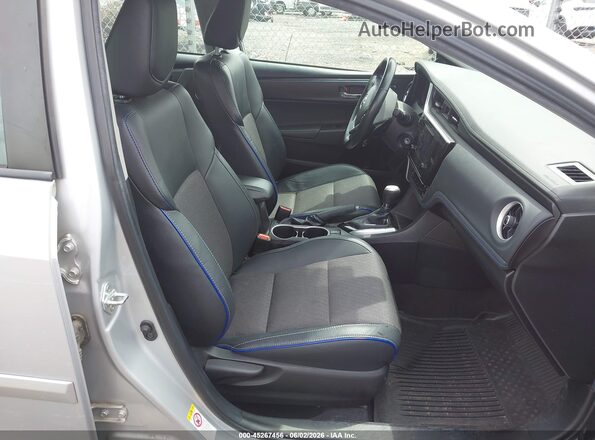2T1BURHE8KC149962 2019 TOYOTA COROLLA Серебряный Вид салона спереди