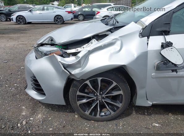 2T1BURHE8KC149962 2019 TOYOTA COROLLA Серебряный Вид спереди