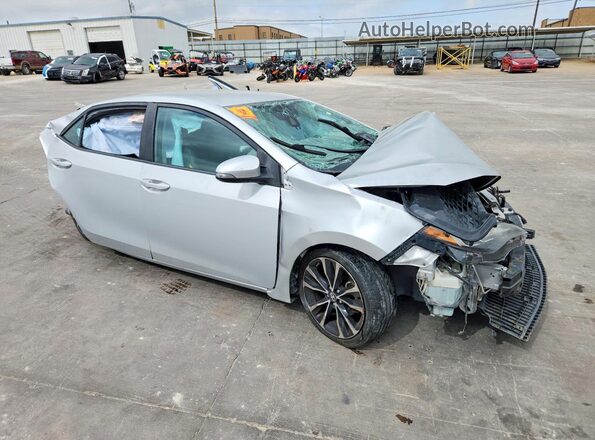 2T1BURHE8KC209884 2019 TOYOTA COROLLA Silver Front right