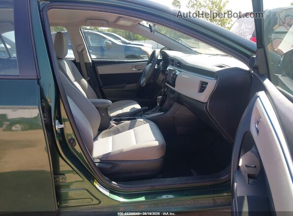 2T1BURHE9GC521235 2016 TOYOTA COROLLA Green Front interior view
