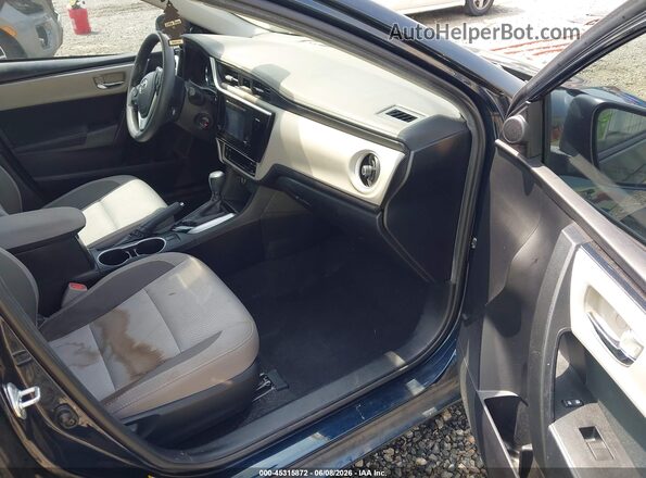 2T1BURHE9HC770569 2017 TOYOTA COROLLA Синий Вид салона спереди