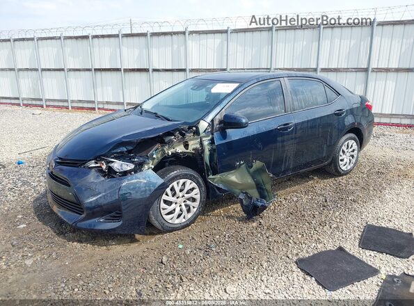 2T1BURHE9HC770569 2017 TOYOTA COROLLA Синий Передняя левая четверть