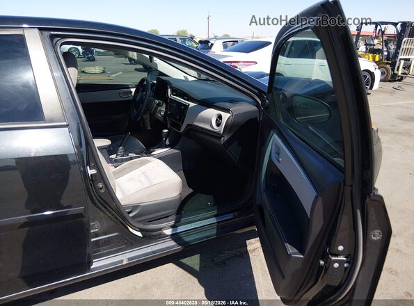 2T1BURHE9HC778316 2017 TOYOTA COROLLA Black Front interior view