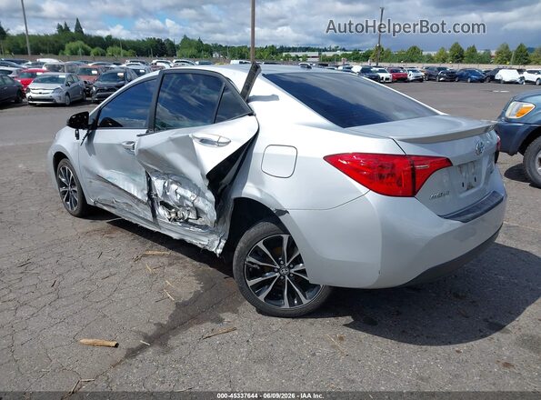 2T1BURHE9HC798632 2017 TOYOTA COROLLA Серебряный Задняя левая четверть