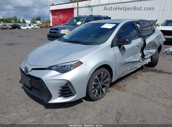 2T1BURHE9HC798632 2017 TOYOTA COROLLA Серебряный Передняя левая четверть