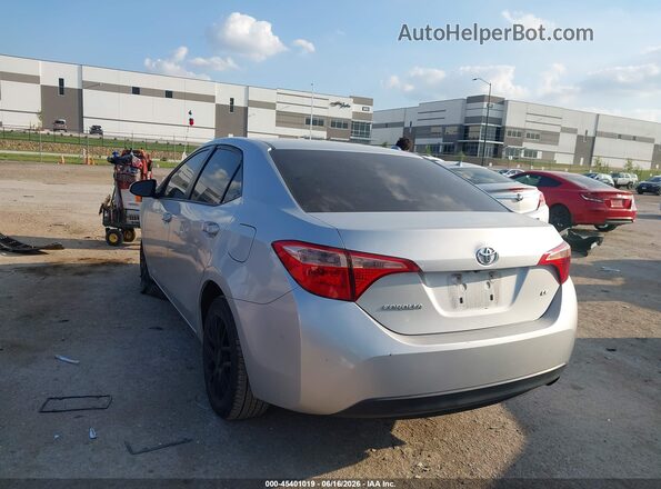 2T1BURHE9HC906294 2017 TOYOTA COROLLA Silver Trasero izquierdo