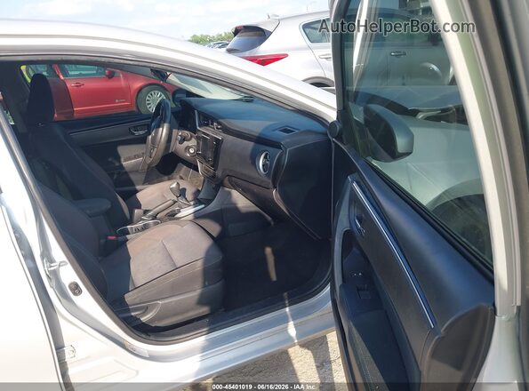 2T1BURHE9HC906294 2017 TOYOTA COROLLA Silver Vista interior delantera