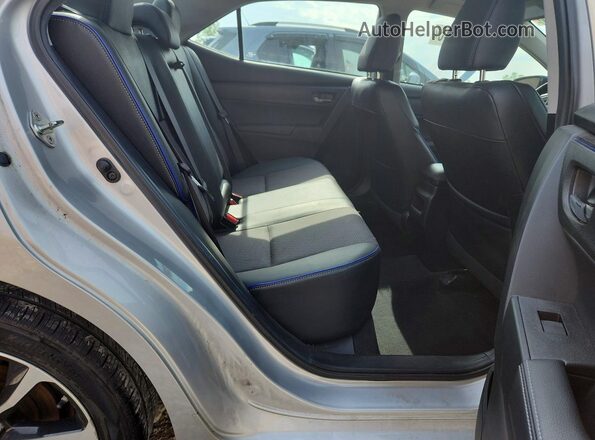 2T1BURHE9JC033216 2018 TOYOTA COROLLA Silver Rear interior view