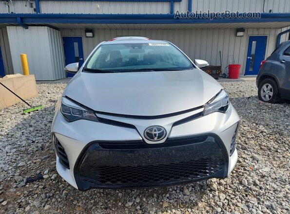 2T1BURHE9JC033216 2018 TOYOTA COROLLA Silver Front view