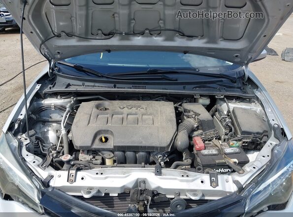 2T1BURHE9JC051151 2018 TOYOTA COROLLA Silver Вид ззаду