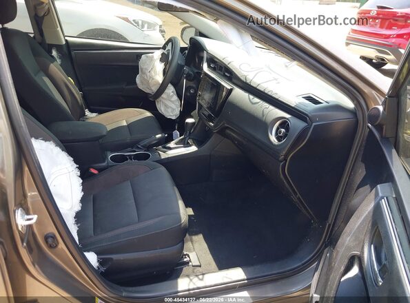 2T1BURHE9JC987304 2018 TOYOTA COROLLA Gray წინა სალონის ხედი
