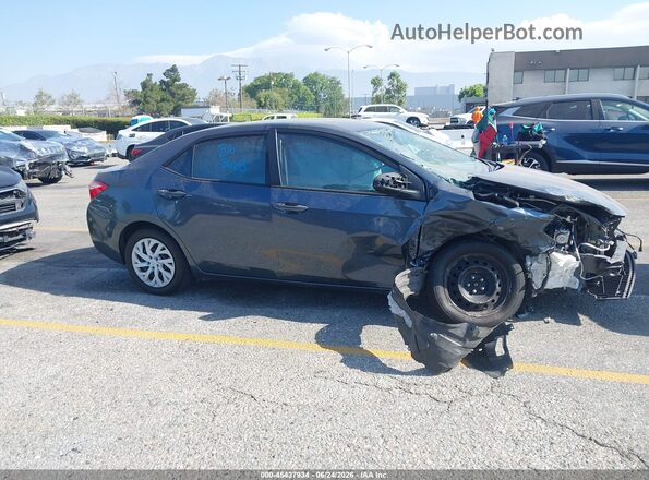 2T1BURHE9KC160999 2019 TOYOTA COROLLA Light Blue Widok wnętrza z tyłu