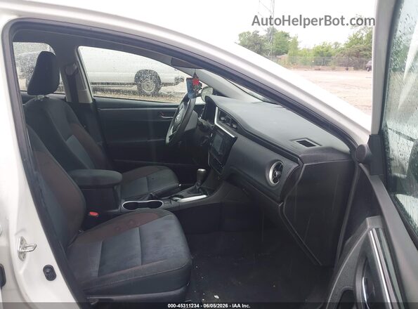 2T1BURHE9KC210445 2019 TOYOTA COROLLA White Вид салону спереду