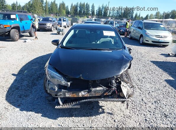 2T1BURHEXHC800582 2017 TOYOTA COROLLA Black Вид задньої частини салону