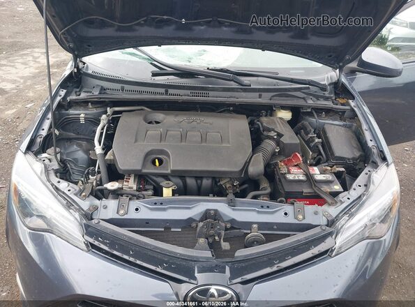 2T1BURHEXHC813378 2017 TOYOTA COROLLA Gray Vista trasera