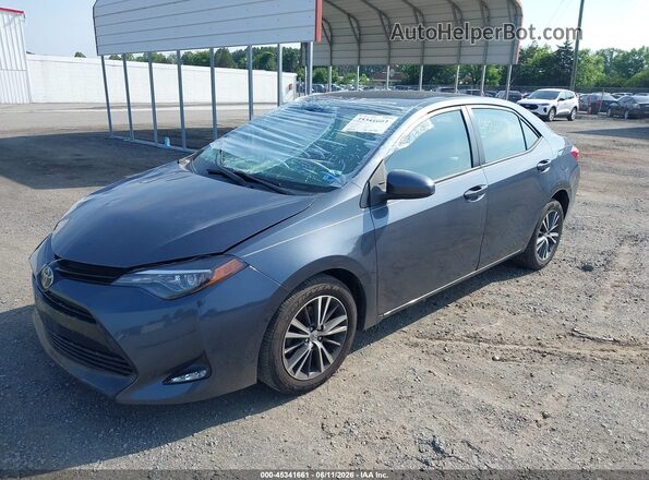 2T1BURHEXHC813378 2017 TOYOTA COROLLA Gray Vista tres cuartos delantera izquierda