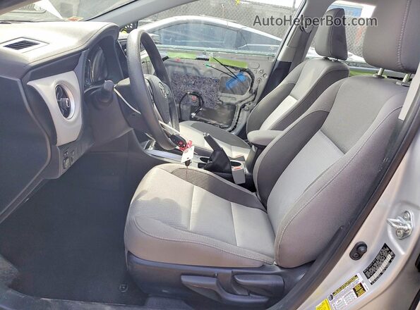 2T1BURHEXHC860233 2017 TOYOTA COROLLA Silver Front interior view