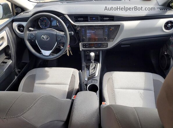 2T1BURHEXHC860233 2017 TOYOTA COROLLA Silver Dashboard view