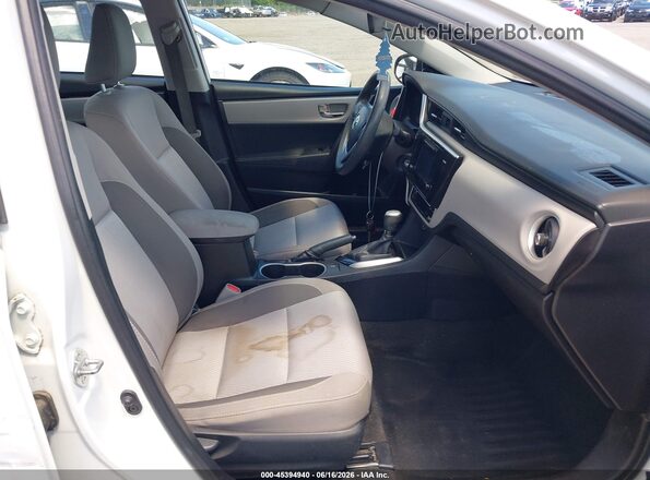 2T1BURHEXHC864993 2017 TOYOTA COROLLA White წინა სალონის ხედი