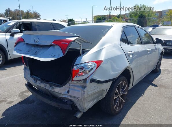2T1BURHEXJC019082 2018 TOYOTA COROLLA Серебряный Задняя правая четверть