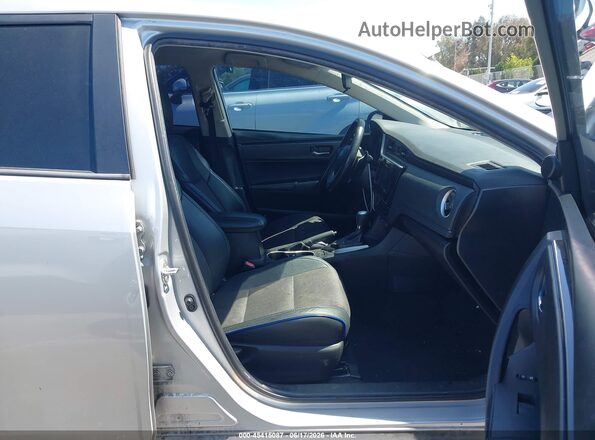 2T1BURHEXJC019082 2018 TOYOTA COROLLA Серебряный Вид салона спереди