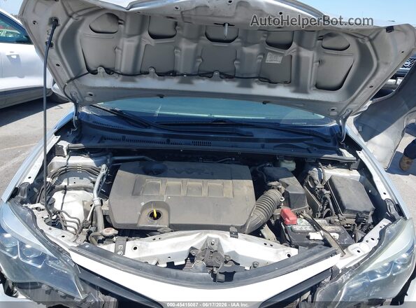 2T1BURHEXJC019082 2018 TOYOTA COROLLA Серебряный Вид сзади