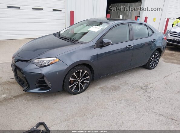 2T1BURHEXJC994522 2018 TOYOTA COROLLA Blue Vista tres cuartos delantera izquierda