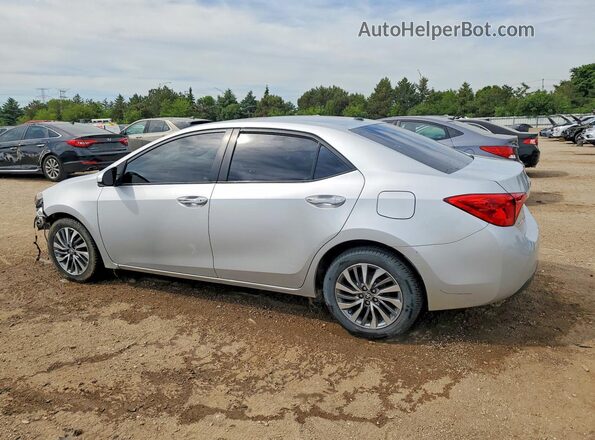 2T1BURHEXKC193008 2019 TOYOTA COROLLA Silver Tył lewy