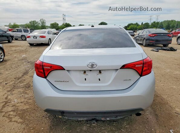 2T1BURHEXKC193008 2019 TOYOTA COROLLA Silver Widok z tyłu