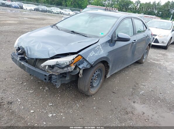 2T1BURHEXKC198094 2019 TOYOTA COROLLA Gray Vista tres cuartos delantera izquierda