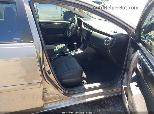 2T1BURHEXKC222829 2019 TOYOTA COROLLA Tan Front interior view