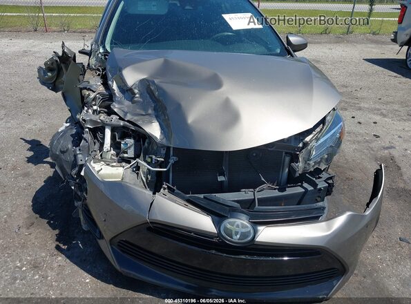 2T1BURHEXKC222829 2019 TOYOTA COROLLA Tan Front view