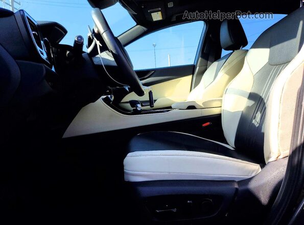 2T2ADCAZ9RC009947 2024 LEXUS NX Gray Vista interior delantera