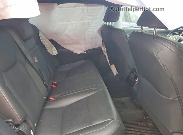2T2BBMCA0PC021974 2023 LEXUS RX White Rear interior view