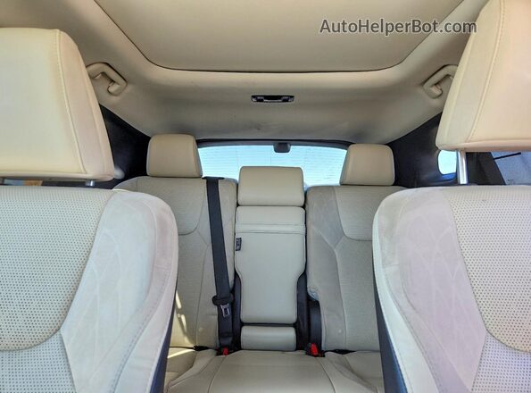 2T2BBMCAXPC013946 2023 LEXUS RX White Rear seats view