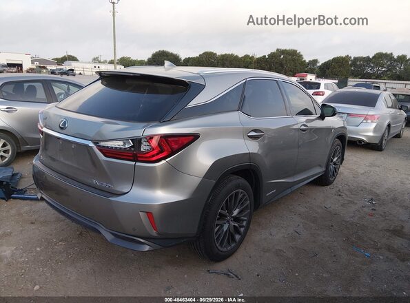 2T2BGMCA1KC041127 2019 LEXUS RX Beige Rear right