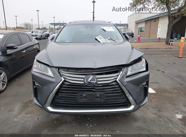 2T2BGMCA8KC034322 2019 LEXUS RX 450H Gray Rear interior view