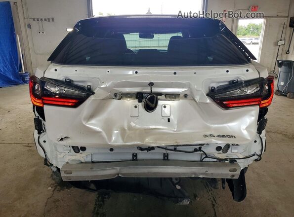2T2BGMCAXKC040848 2019 LEXUS RX White Rear view