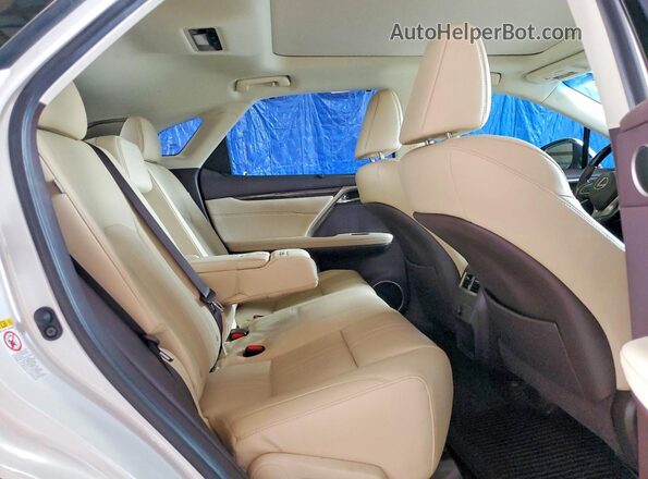 2T2BGMCAXKC040848 2019 LEXUS RX White Rear interior view