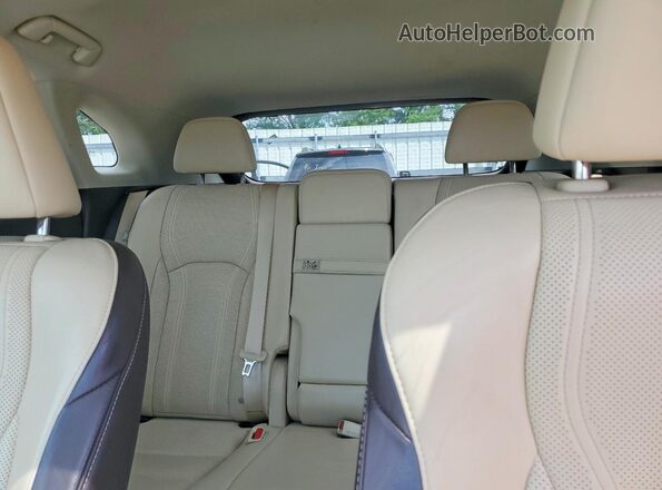 2T2BZMCA1HC070808 2017 LEXUS RX White Vista de los asientos traseros