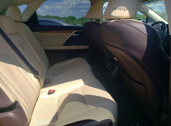 2T2BZMCA1KC178112 2019 LEXUS RX Gray Vista de los asientos traseros